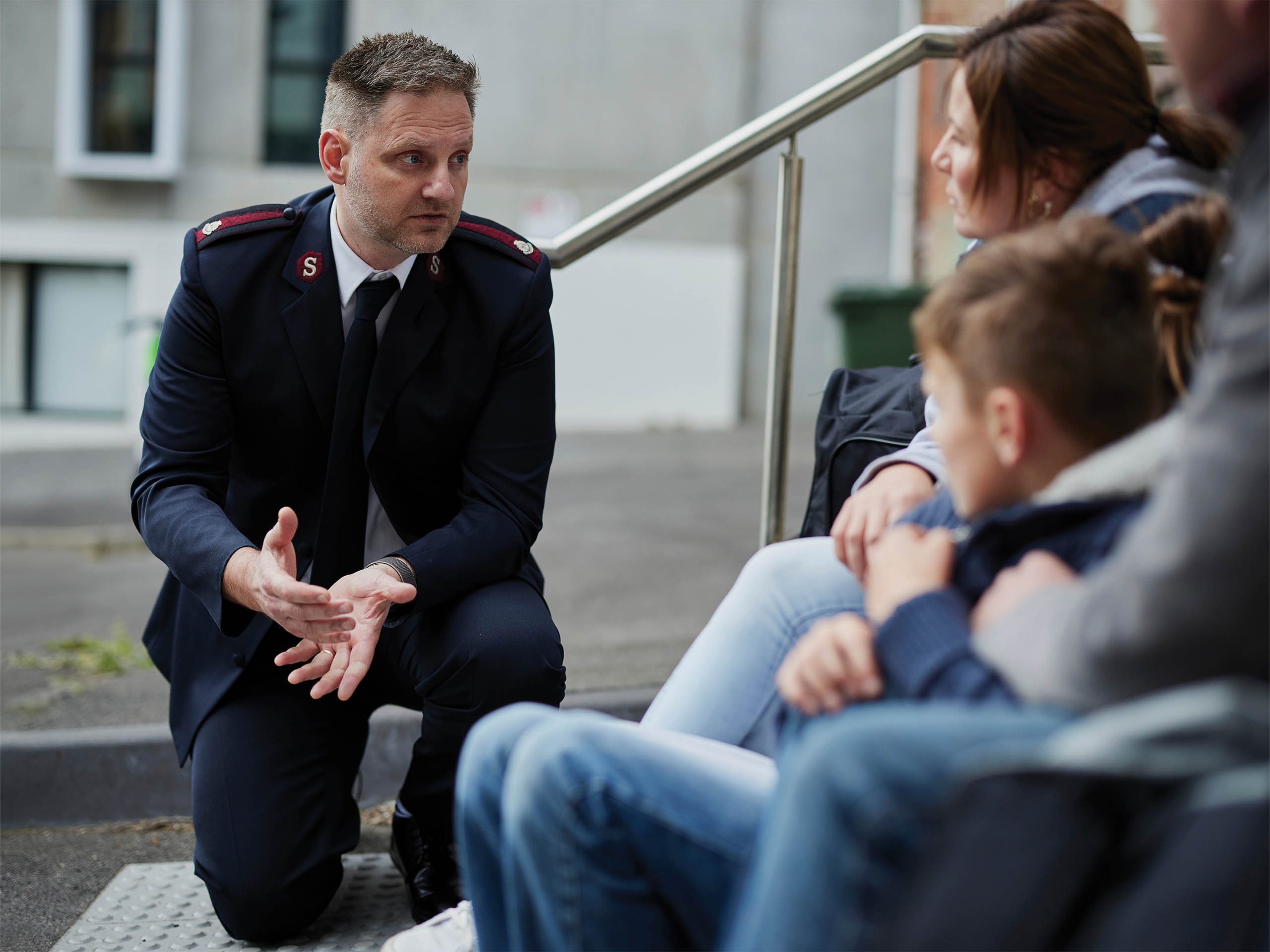 Salvos officer talking to people